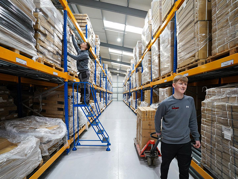 Workplace Depot employees in their warehouse.